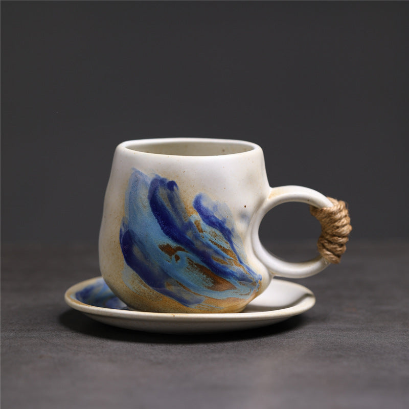 Tazza di caffè a orecchio rotondo bianco